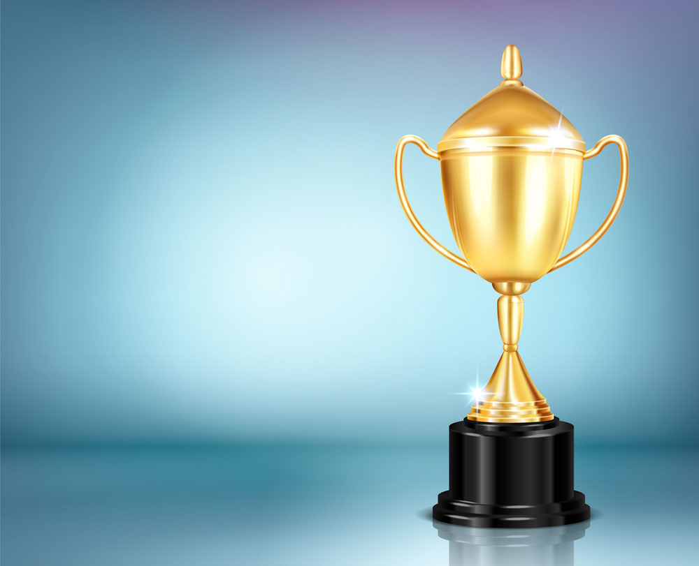 gold trophy on blue background
