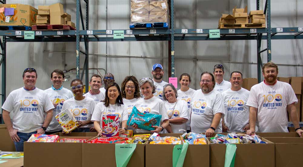 Group of people in warehouse